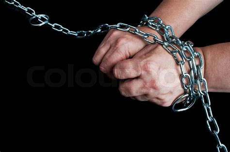 Hands In Chain On A Black Background Stock Image Colourbox