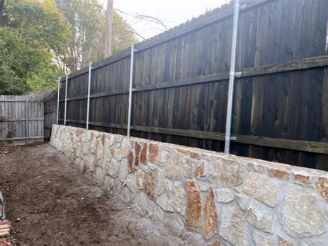 Replaced Cross Ties Retaining Wall With Milsap Stone Wall With New