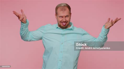 Funny Joyful Man Making Playful Silly Facial Expressions Grimacing