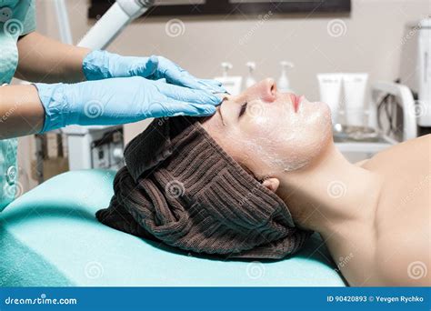 Anti Aging Facial Massage Cosmetologist Doing Massage For Young Woman