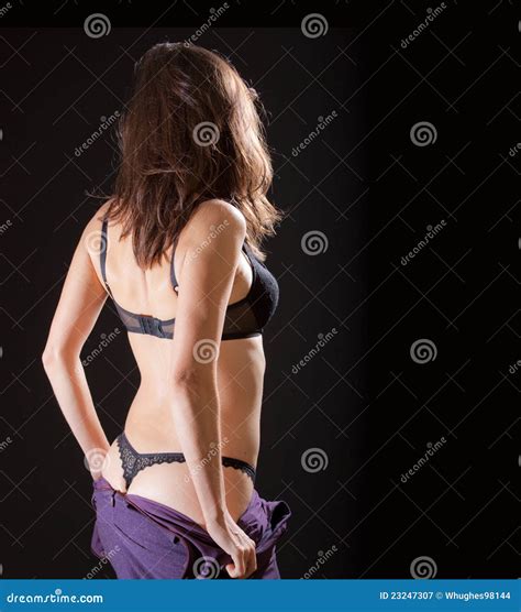 A Beautiful Sexy Woman Removing Her Dress Royalty Free Stock