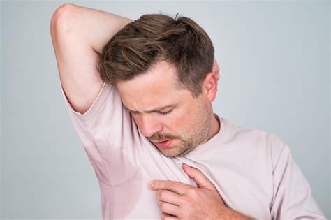 Premium Photo Man With Hyperhidrosis Sweating Very Badly Under Armpit