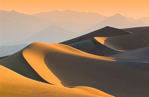 "Sand dunes over sunrise sky in Death valley, California" by javarman ...