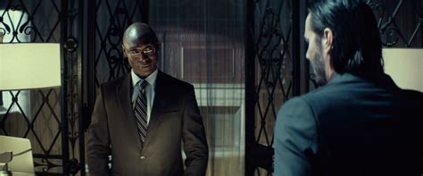 John Wick 4 Lance Reddick Tornerà Nel Ruolo Di Charon