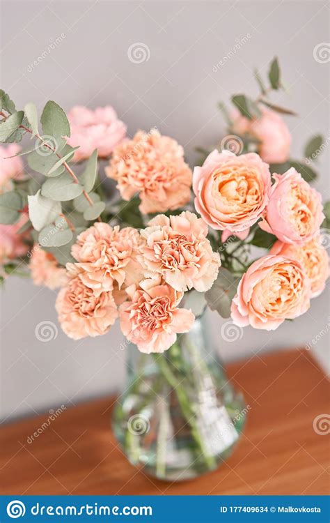 Flowers In Glass Vase On Wooden Table Fresh Cut Flowers For Decoration