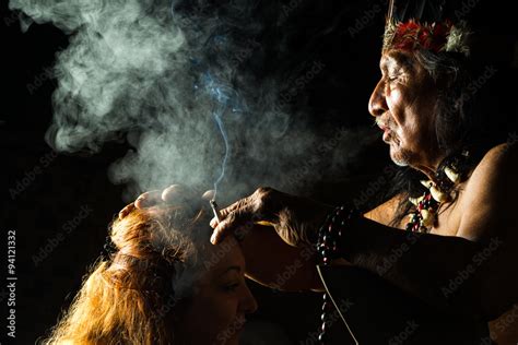 A Mayan Shaman Performs An Ayahuasca Ceremony In The Amazon Jungle Of Ecuador Using Plant