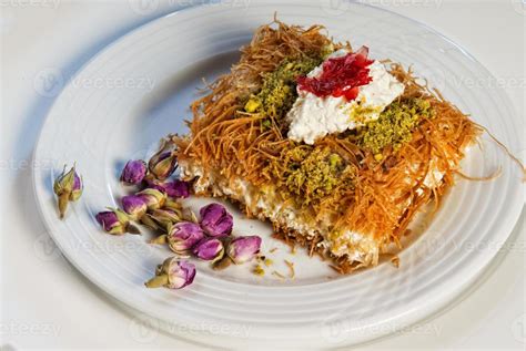 Plate of oriental Arabic sweets baklava with rose 3691164 Stock Photo ...