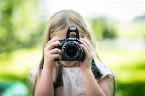 Download Child Using Camera Royalty Free Stock Photo and Image