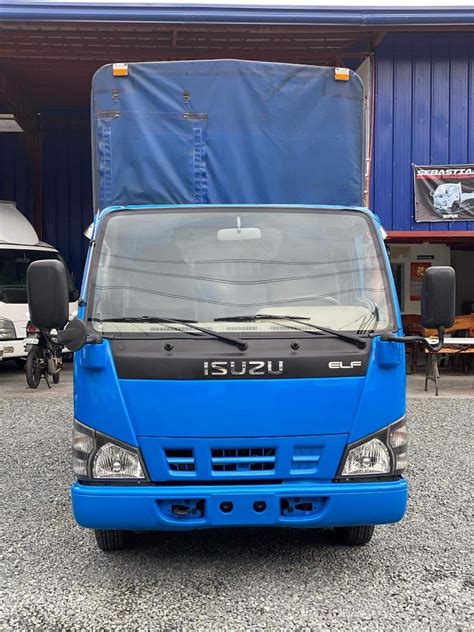 Isuzu Elf Ft Dropside With Detachable Canvas And Stick Body Single