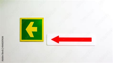 Green yellow left arrow acrylic sign and red arrow on white acrylic ...