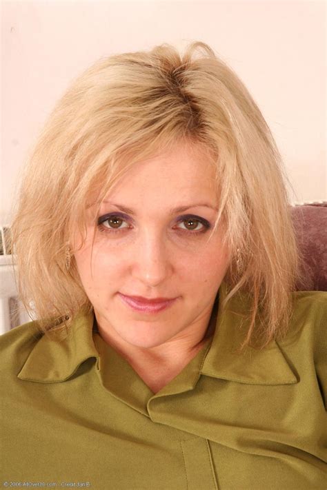 Horny Milf Stripping Off Pantyhose On The Couch Porn Pictures XXX Photos Sex Images