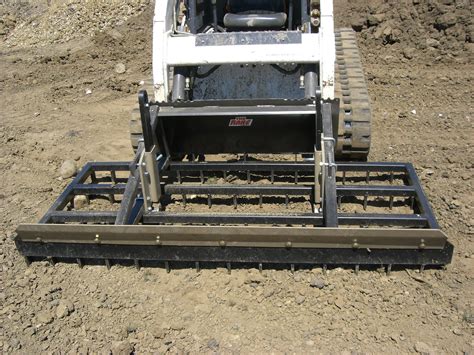 The Rake Landscaping Skid Steer Attachment Daniel Mfg Inc