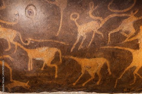 Prehistorical Cave Paintings Of Hunting Scene With Deers And Horses And