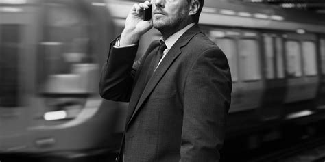 Businessman on train station | Photo - rawpixel