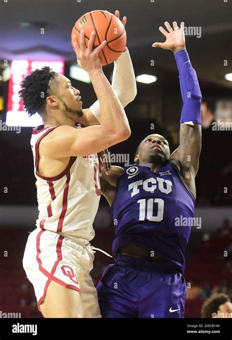 Oklahoma Guard Jordan Goldwire Left Goes Up For A Shot Over TCU