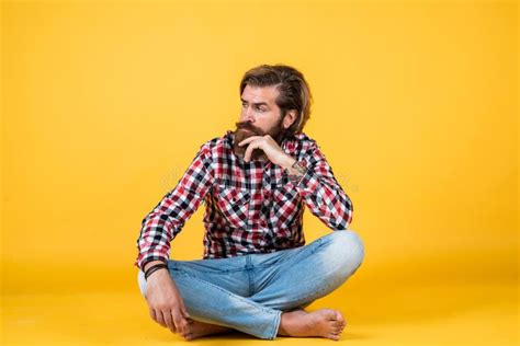 Serious Handsome Bearded Guy With Unshaven Face And Stylish Hairdo Wear