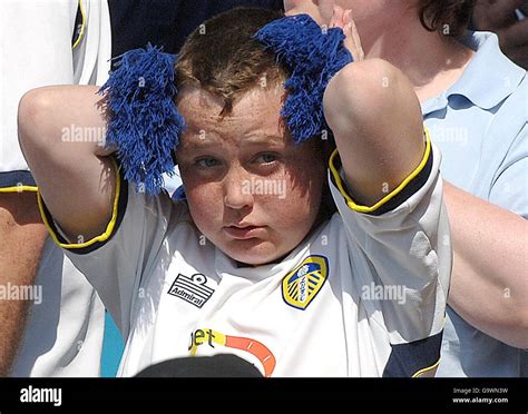 A Leeds United Supporter Shows His Disappointment After The Coca Cola