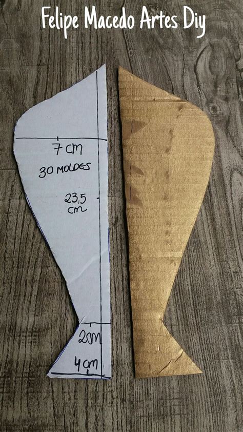 A Piece Of Paper That Has Been Cut Out To Look Like An Origami Fish