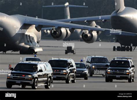 The car of US President Barack Obama (front L) is protected by Secret ...