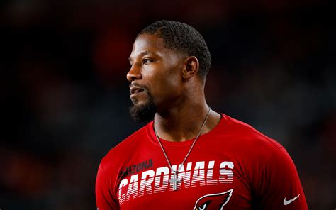 Cardinals David Johnson works to get back on field