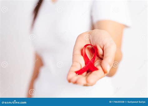 Closeup Woman Hand Holding Red Ribbon Hiv World Aids Day Awareness