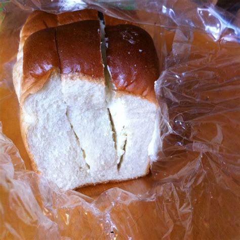 Half Of A Loaf Of Korean Bread With Sweet Butter Cream Pipped In Between Yikes Food Recipes