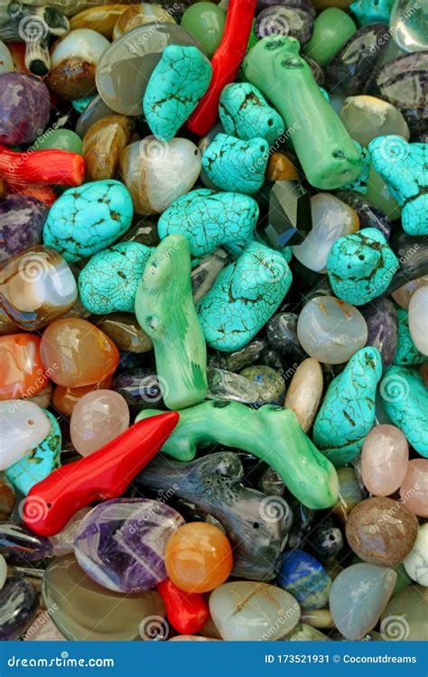 Vertical Image Of Heap Of Multi Color Semi Precious Stones For