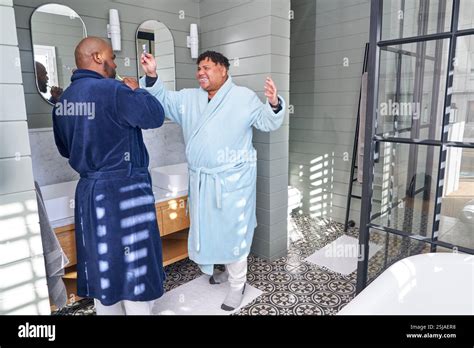Gay Couple Brushing Teeth Stock Photo Alamy