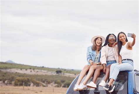 Premium Photo Selfie Road Trip And Women Friends On Car Roof In Sky