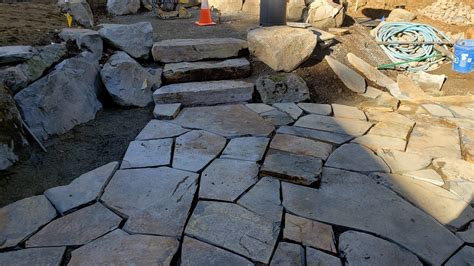 Montana Flagstone Patio And Stone Risers Sublime Garden Design Landscape Design Serving