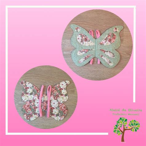 Two Butterfly Hair Clips On A Pink Background