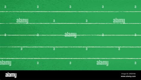 Top View Of A Green Running Track Divided By Horizontal Markings Into