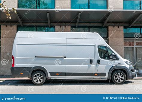 White Fiat Ducato Cargo Van With Tall Roof Parked On The Street