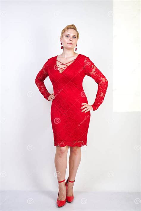 Fashion Female In Red Lace Dress Standing Alone Plus Size Blonde Woman