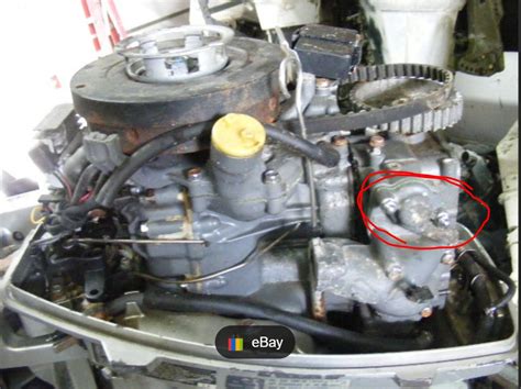 Where Is The Thermostat Housing Cover Located On A 2010 Honda BF15