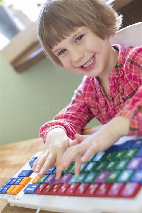 Child Typing on Colourful Computer Keyboard Stock Image - Image of ...