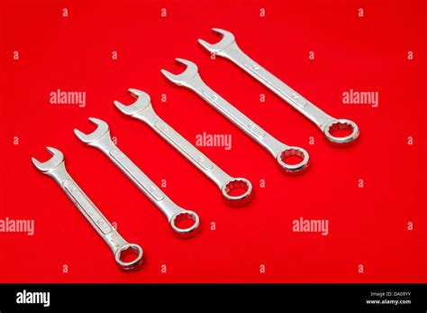 industrial tools   red background stock photo alamy