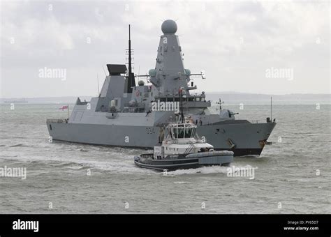 The Royal Navy Type 45 Destroyer Hms Diamond Arriving At Her Homeport