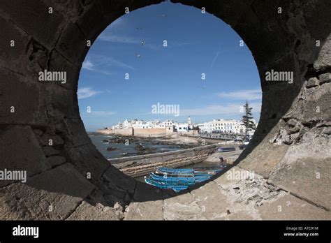 Circular Port Hole In Town Walls Looking To Town Walls And Medina