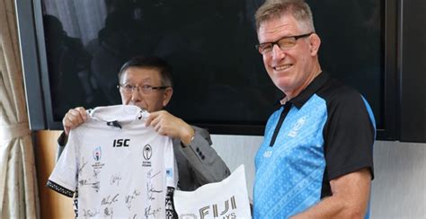 Flying Fijians team management present signed Flying Fijians jersey to ...