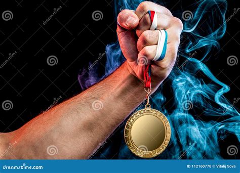 Man Hand Holding A Gold Medal Stock Photo Image Of Challenge Gold