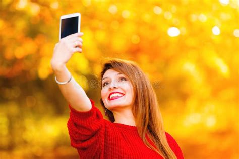 Girl Taking Self Picture Selfie With Smartphone Camera Outdoors Stock