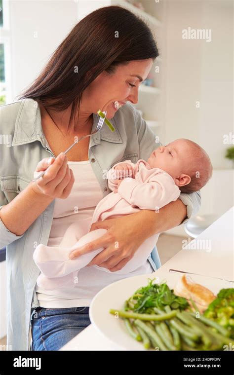 Baby Mother Lunch Babe Babies Human Babies Mom Mothers Mum Lunch Time Stock Photo Alamy