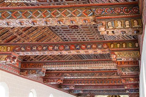 An Intricately Decorated Ceiling In A Building