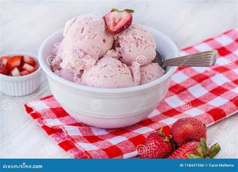 Bowl Filled With Home Made Strawberry Ice Cream With Spoon Stock Photo