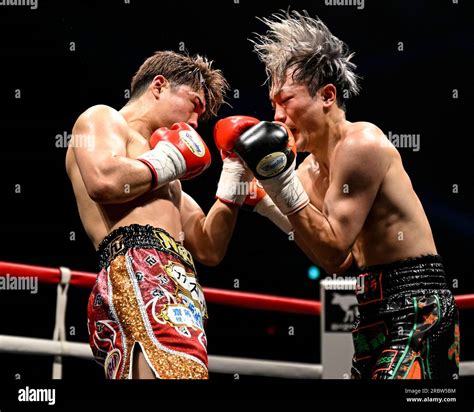 Jin Sasaki Red Gloves And Hiroto Hoshi Black Gloves Compete During