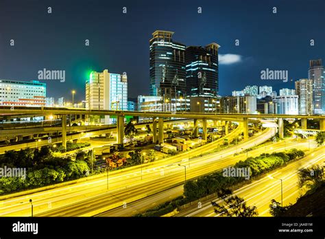 Busy traffic on highway at night Stock Photo - Alamy