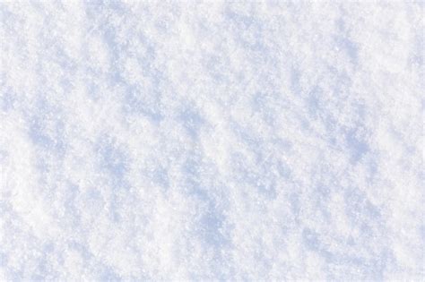 Premium Photo | Texture of the white fluffy snow for background