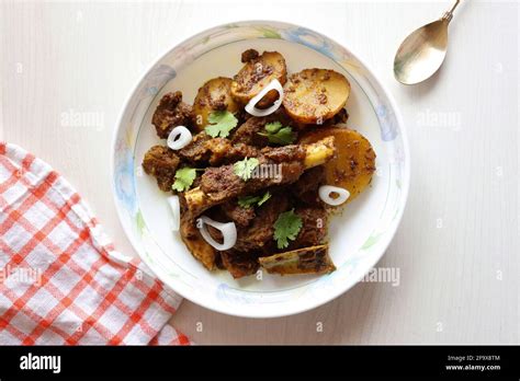 Mutton Ghee Roast Goat Meat Fry With Potatoes Also Known As Mutton