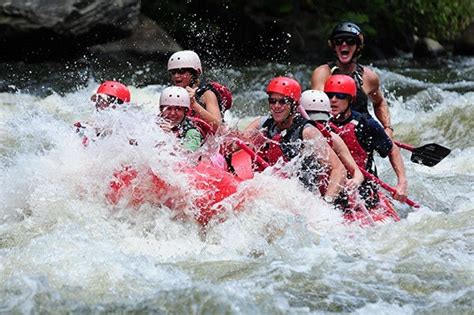 Group Having Fun While Extreme White Water Rafting Near Gatlinburg Tn